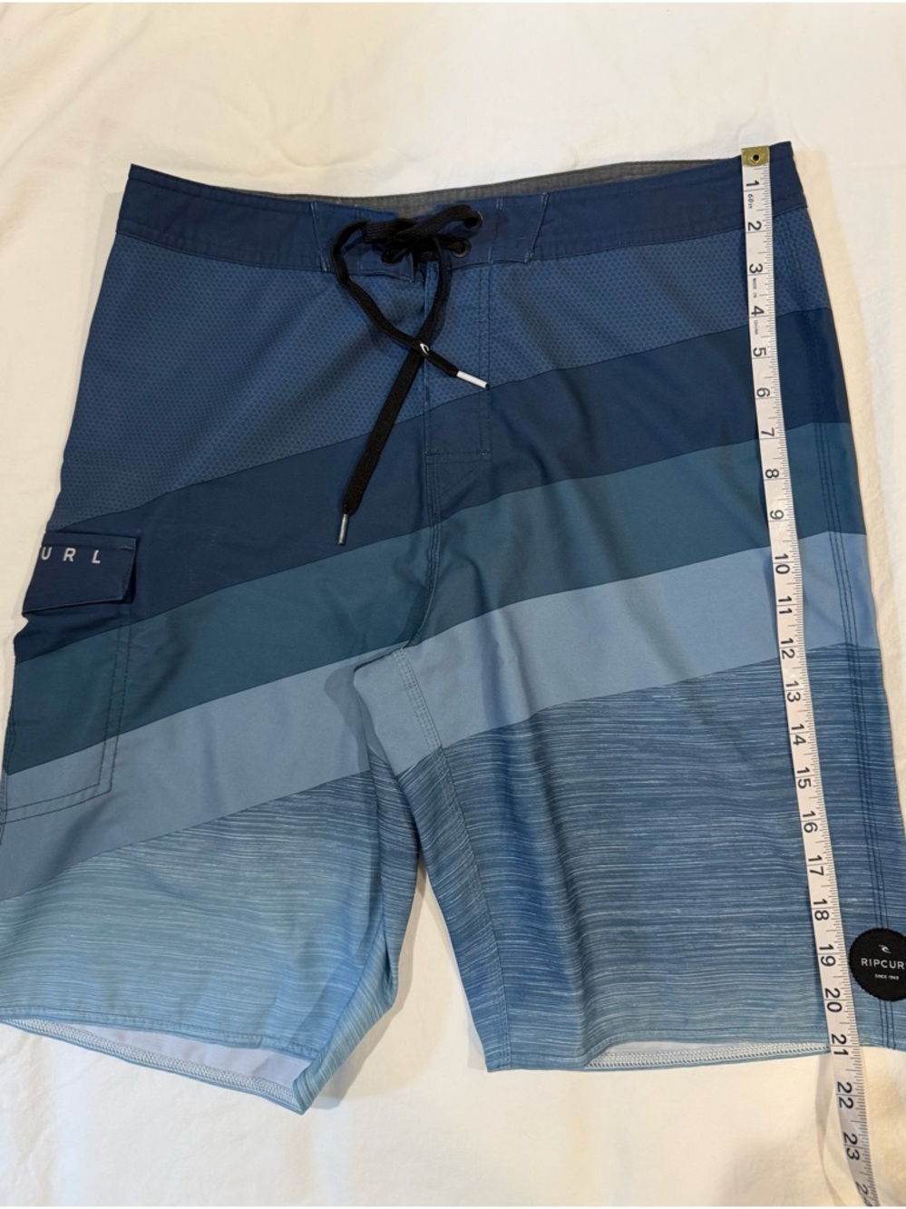 Rip Curl Men’s Navy to Light Blue Striped Boardshorts